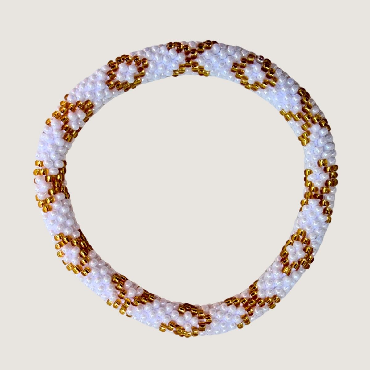 Blanc à losanges dorés