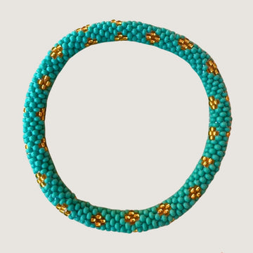 Turquoise à pois doré